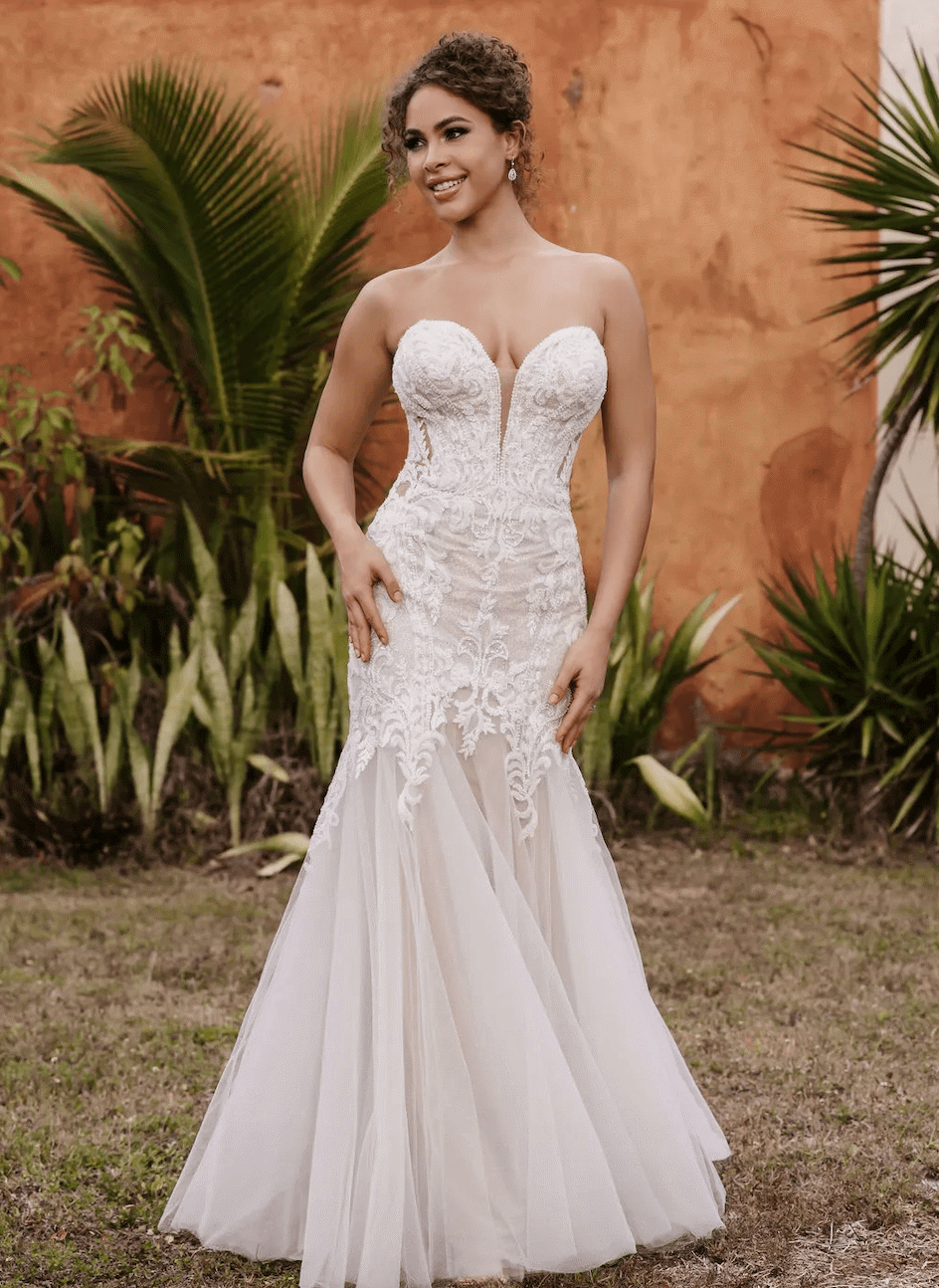 Model wearing a white Allure Gown