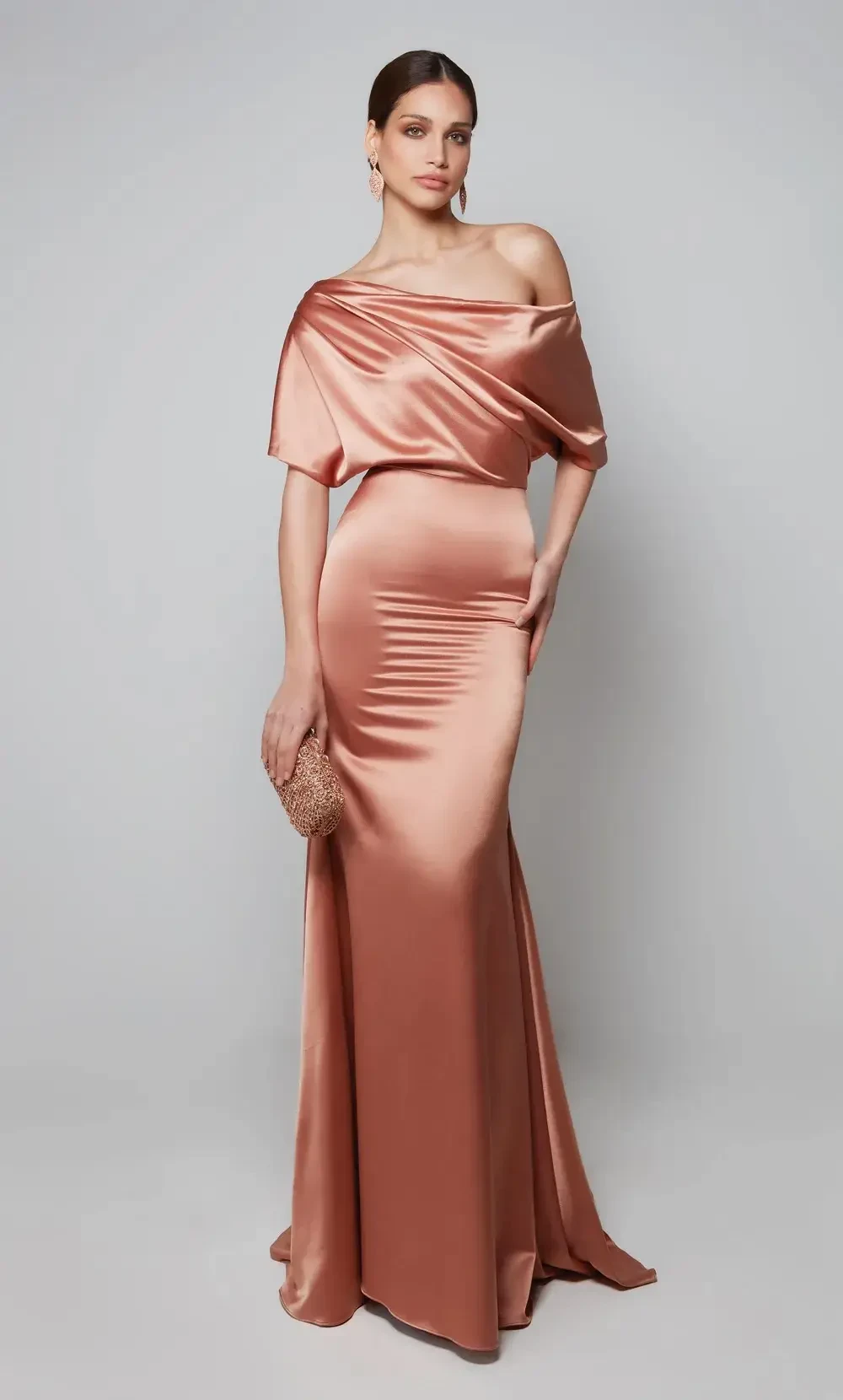 Dressed to Impress: Unveiling the Glamorous Collection of Evening Gowns at Champagne &amp; Lace Bridal Image