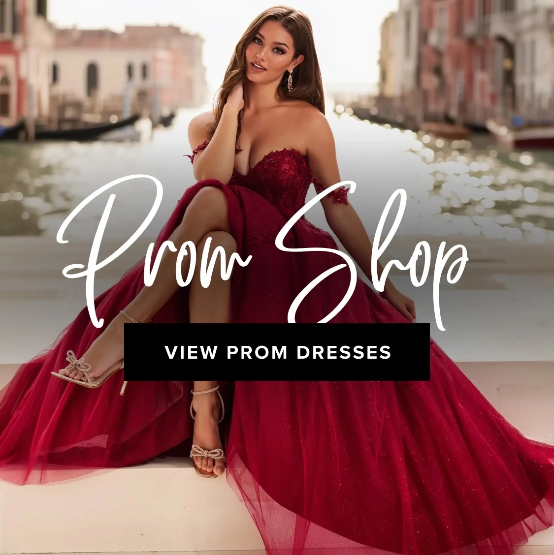 Model wearing a dark pink prom dress